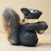 Ornament: Grey Squirrel holding Nut